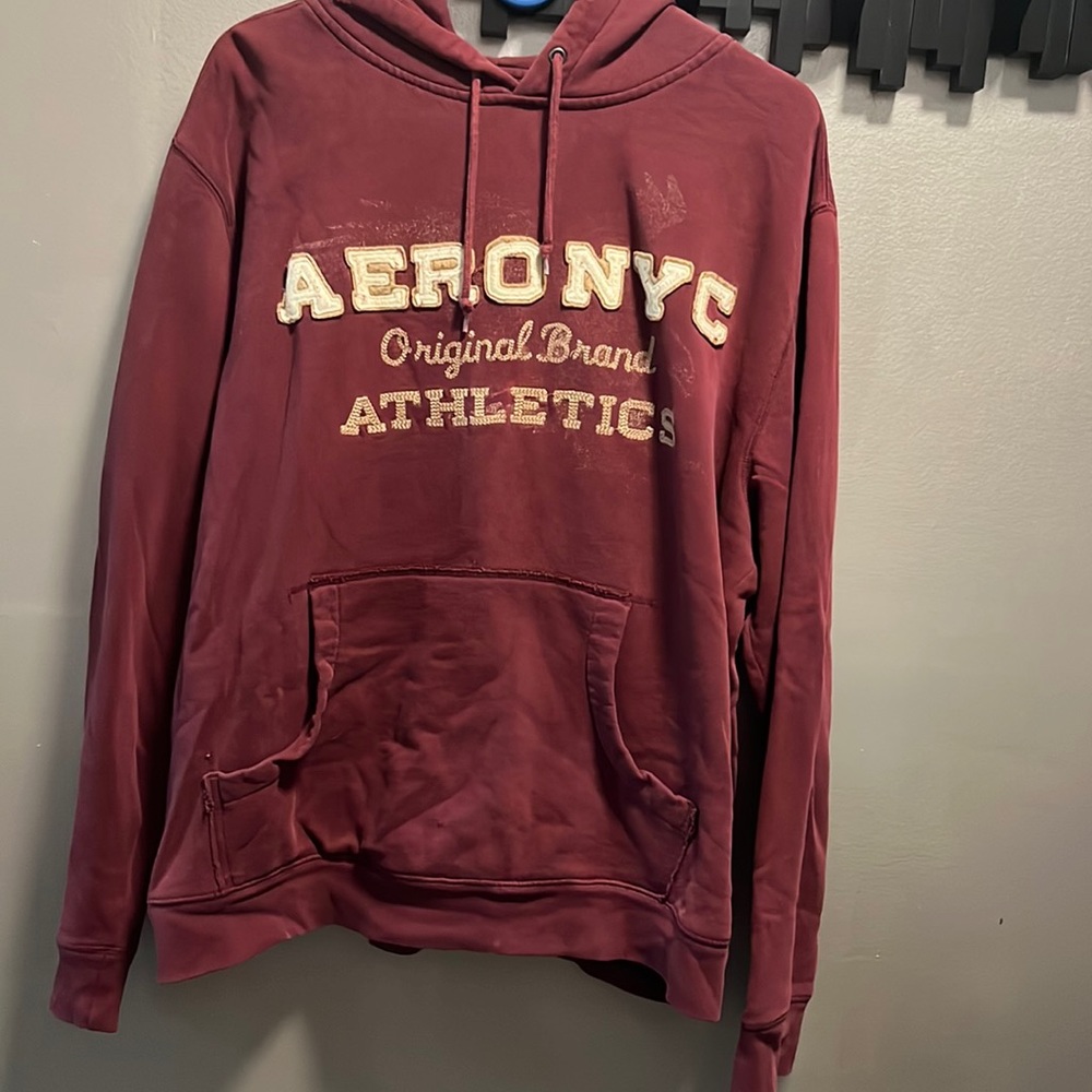 Aeropostale size L slightly distressed around hood burgundy hoodie